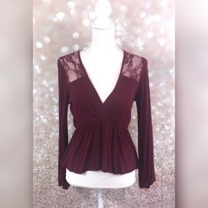 Sheer lace peplum top